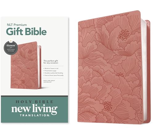 Dusty pink floral Bible with red lettering, shown with its packaging.