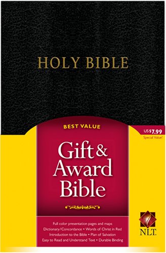 Black Bible with gold lettering and a red and yellow gift presentation.