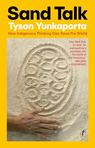 Book cover showing a hand touching circular patterns drawn in sand on yellow background.