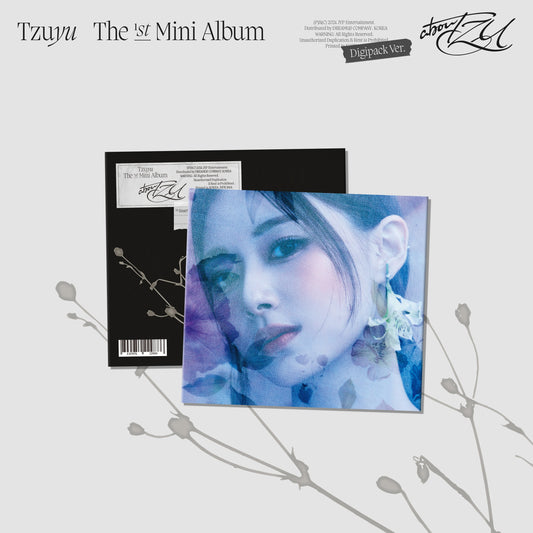 Tzuyu’s “AbouTZU” digipack CD album cover with a portrait and barcode.