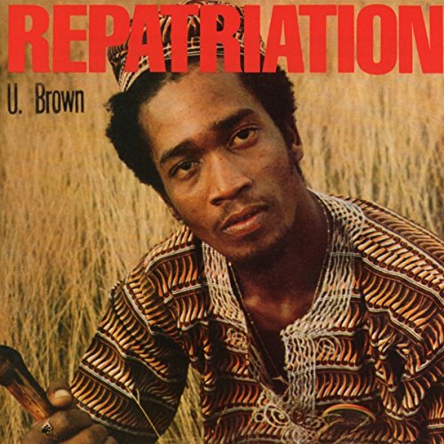 "Album cover with a man in a field, wearing patterned clothing."