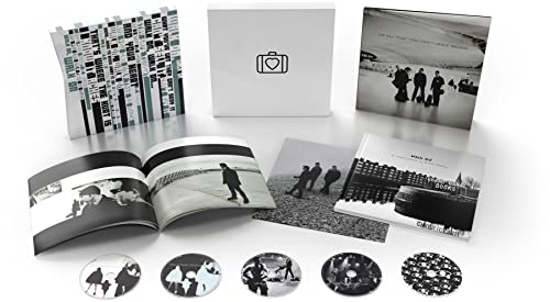 U2 album "All That You Can't Leave Behind" box set with booklet and pins.