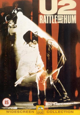 U2 “Rattle and Hum” DVD cover featuring band members in performance.