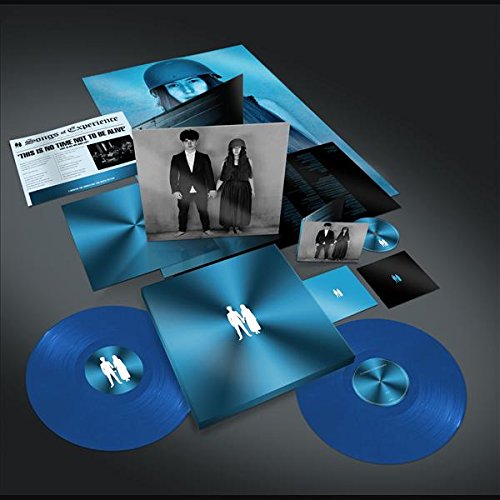 U2 “Songs of Experience” vinyl record set with blue cover and inserts.
