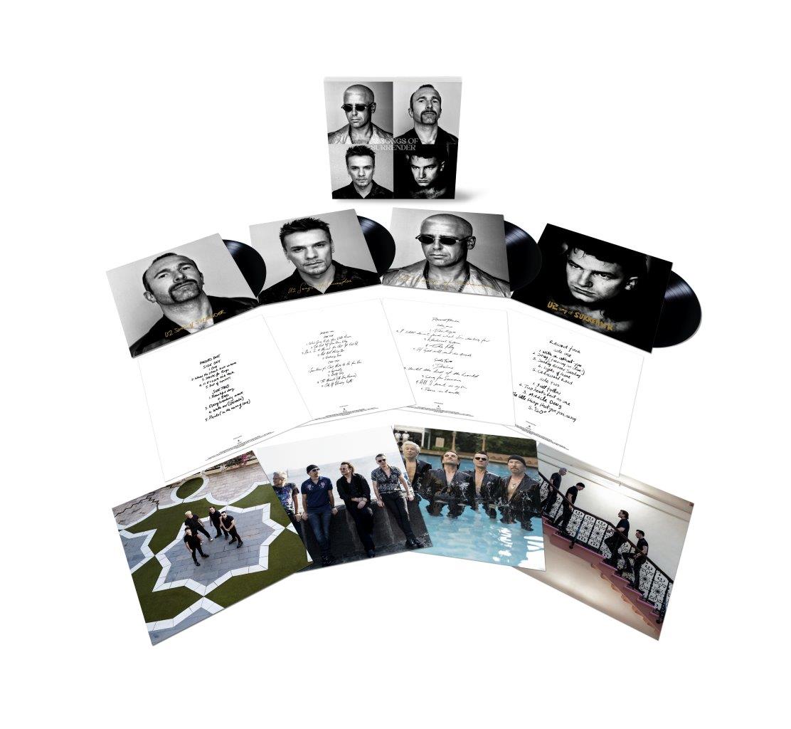 "U2 vinyl boxset with 4 records, booklet, and photos of the band."