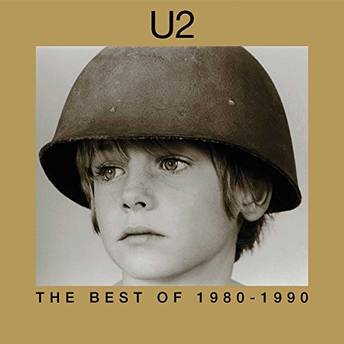 Album cover featuring a child wearing a military helmet on a gold background.