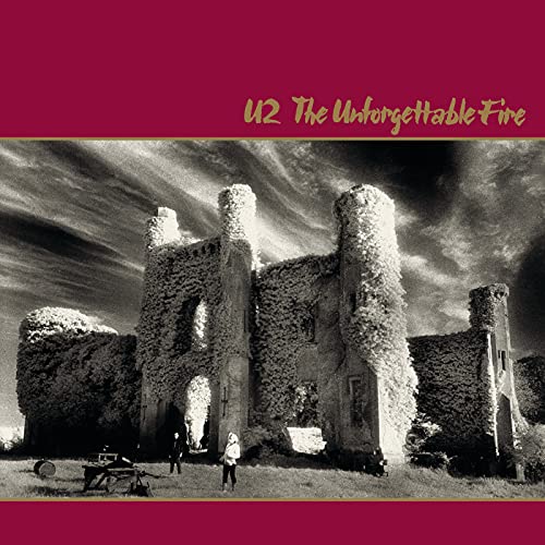 U2’s “The Unforgettable Fire” album cover: ivy-covered ruins in a field.