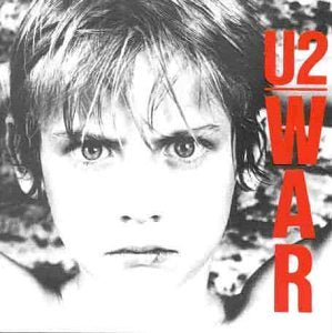 U2 “War” CD cover: black and white portrait with red text.