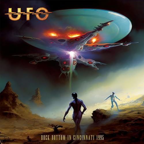 UFO album cover: a large spaceship over a desert landscape.