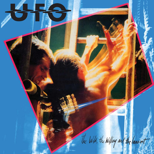 Album cover for UFO showing a man using a blowtorch on a ladder.