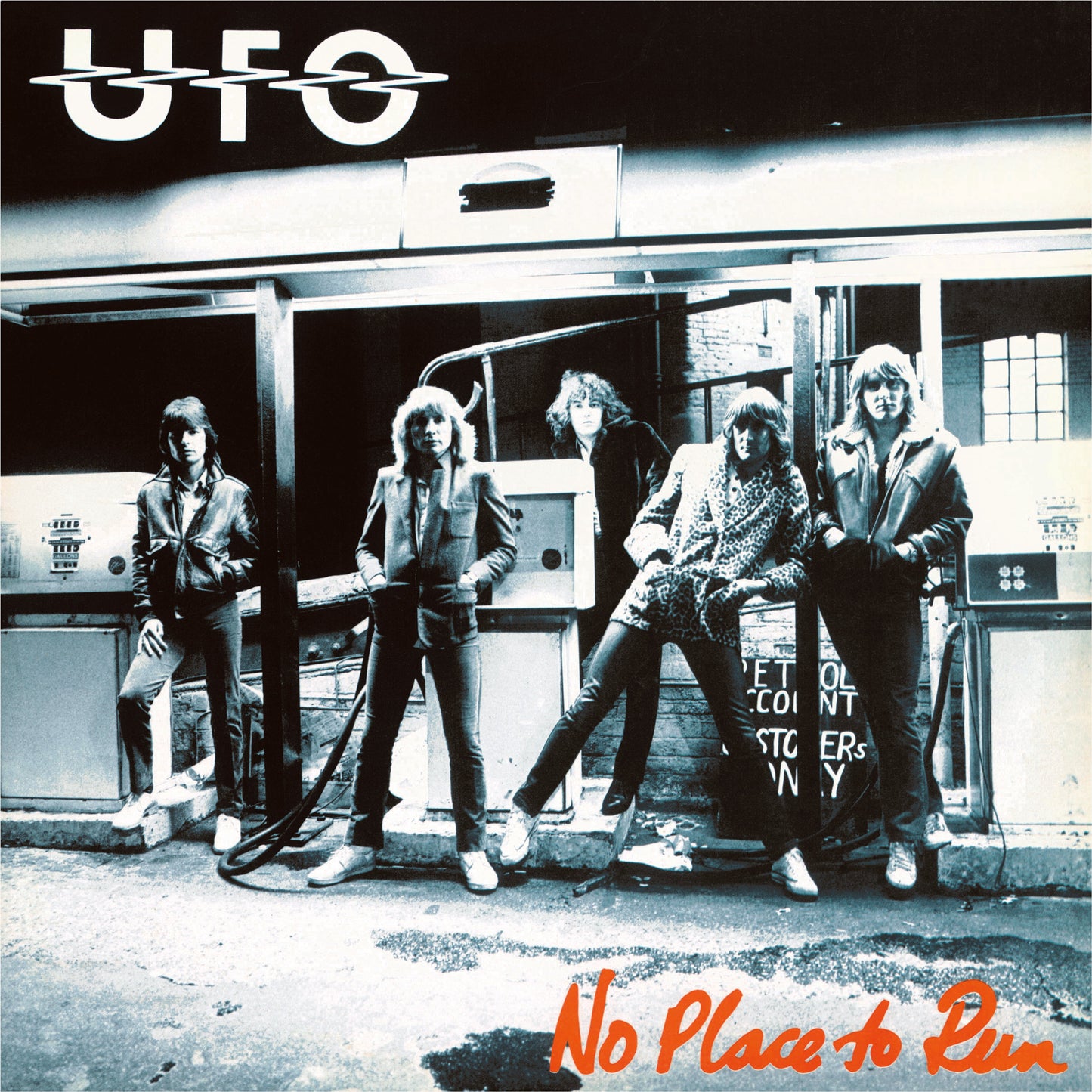 The band UFO standing at a gas station on the No Place to Run album.