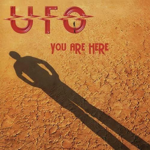 UFO album cover: red logo, desert landscape, and a silhouetted figure.