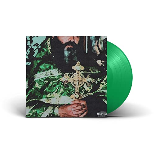 Vinyl record and cover art featuring a bearded man with a cross.