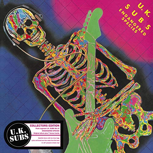 U.K. Subs" album cover with colorful skull, guitar, and skeletal hands.