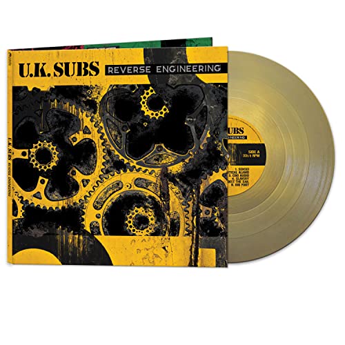 Uk Subs "Reverse Engineering" vinyl record with gold-colored disc and gear artwork.