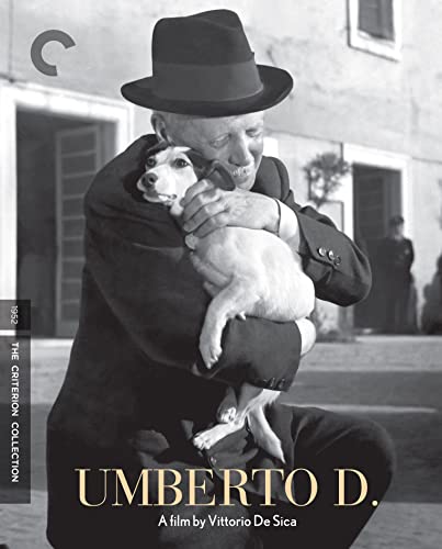 Black and white film poster of an elderly man embracing a small dog.