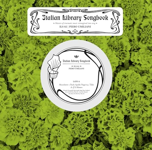 Vinyl record label with ornate design on a bright green floral background.