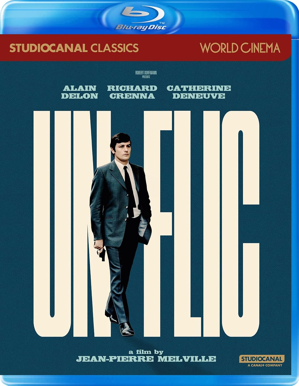 Blu-ray cover for "Un Flic" featuring Alain Delon in a suit.
