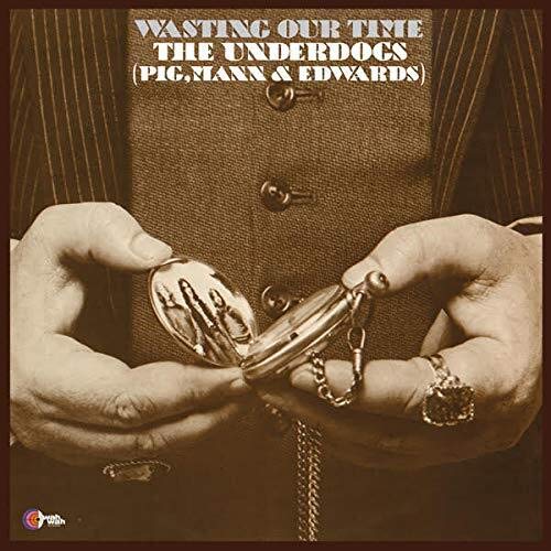 Vinyl record cover: hands holding a pocket watch, sepia tone.