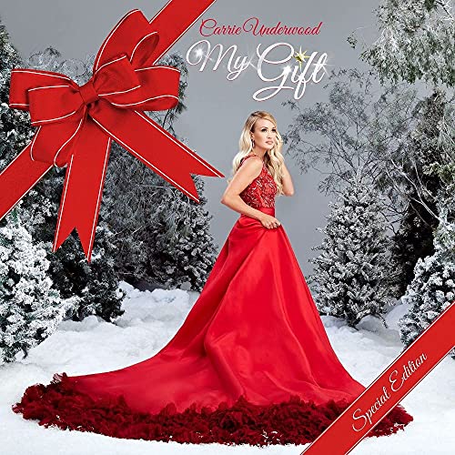 Carrie Underwood album cover, “My Gift,” featuring her in a red gown.