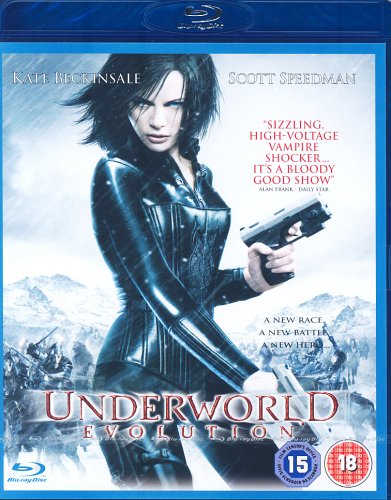 Woman in leather outfit holding gun on blu-ray cover with snowy background.