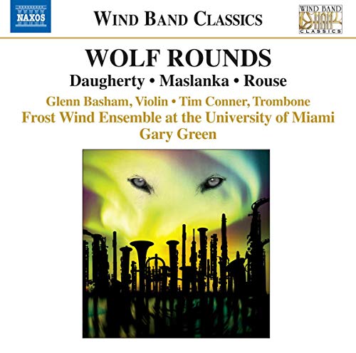 CD cover with text Wolf Rounds and an illustration of wolf eyes above musical instruments.