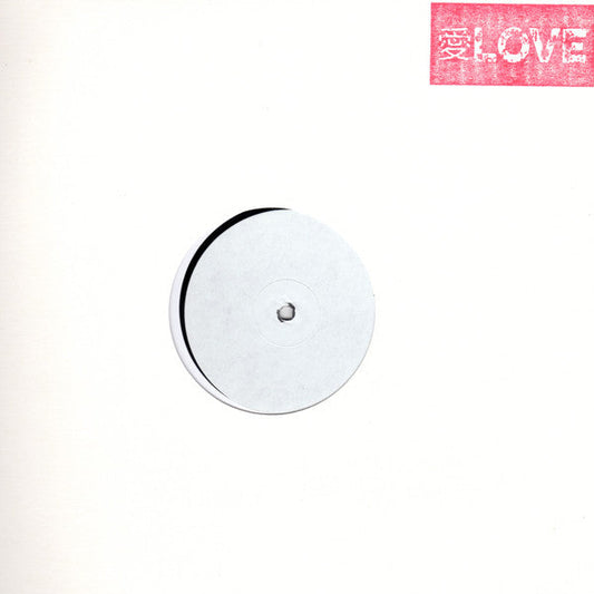 Vinyl record with a central label and red "LOVE" text above.