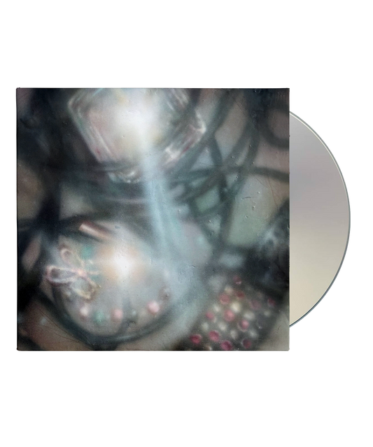 CD case with abstract, blurred floral image and reflective disc.