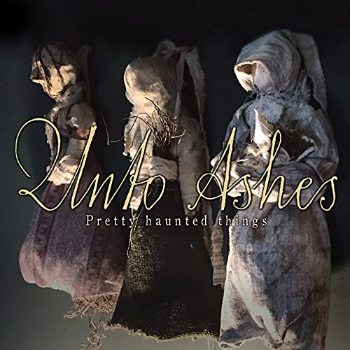 Three ghostly figures in hooded cloaks against a dark background.