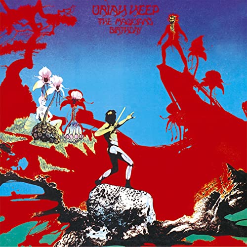 Colorful fantasy scene with figures on a rocky landscape; "Uriah Heep - The Magician's Birthday."