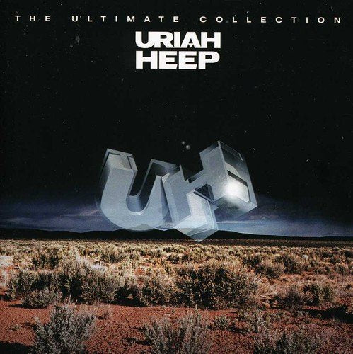 "Uriah Heep album cover with 3D 'UH' logo in a desert landscape."