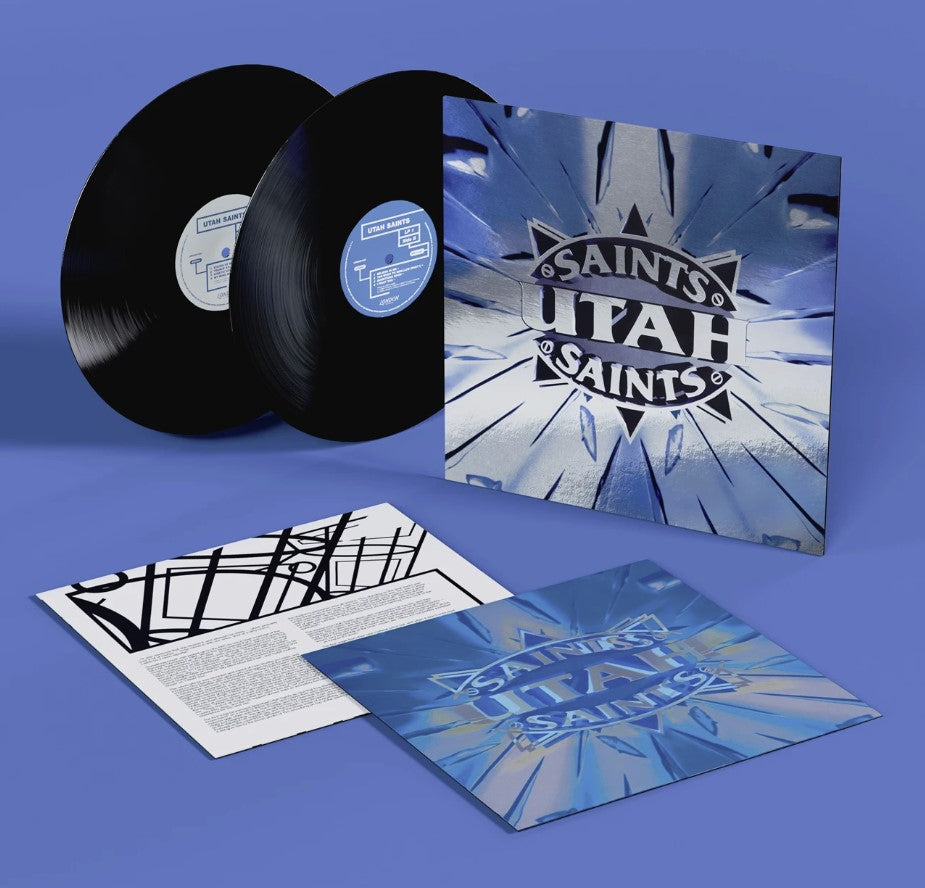 Album cover for Utah Saints featuring blue radial burst design.