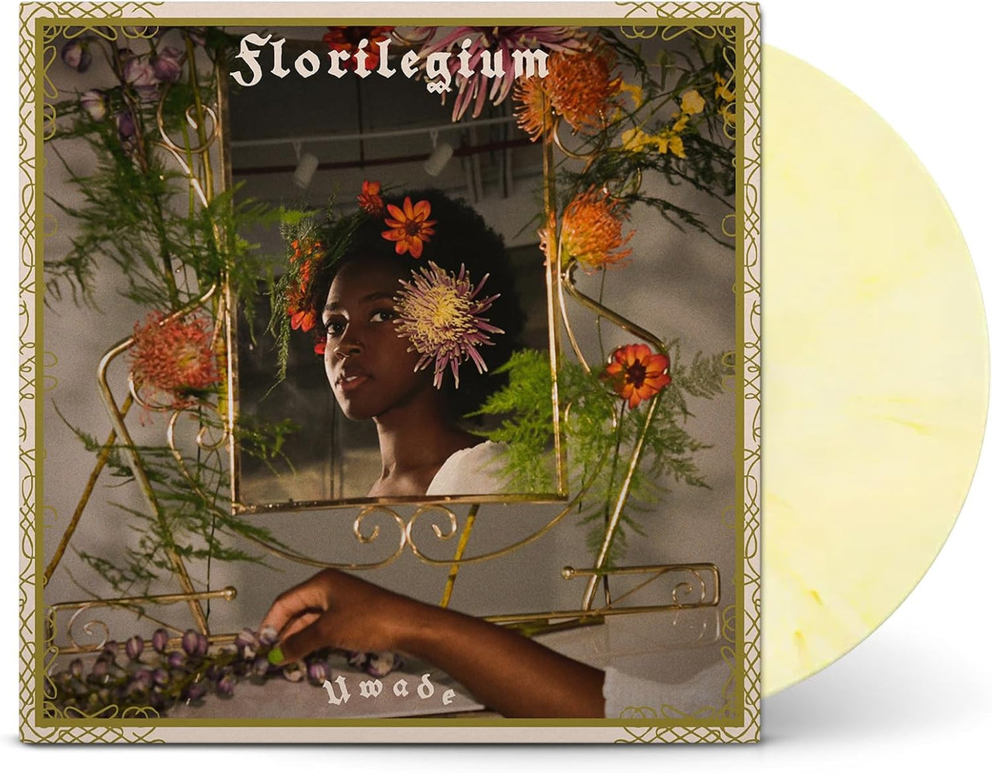 Vinyl record cover featuring a portrait of Uwade against a soft, muted background.