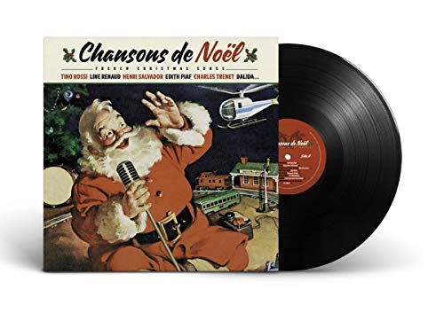 Vintage French Christmas songs vinyl record with Santa Claus illustration.
