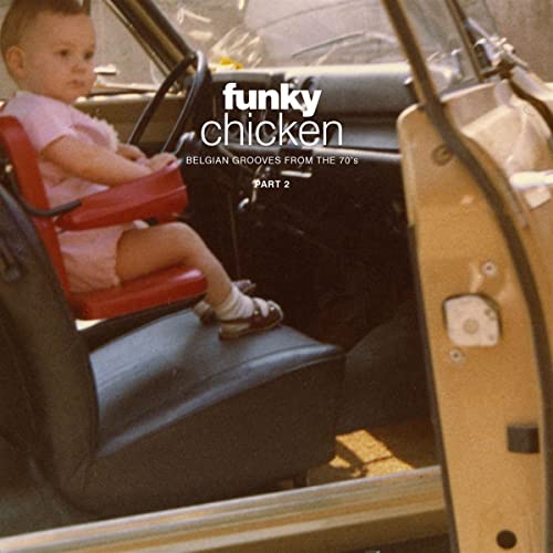 A baby in a red seat sits in a car with Funky Chicken text overlay.