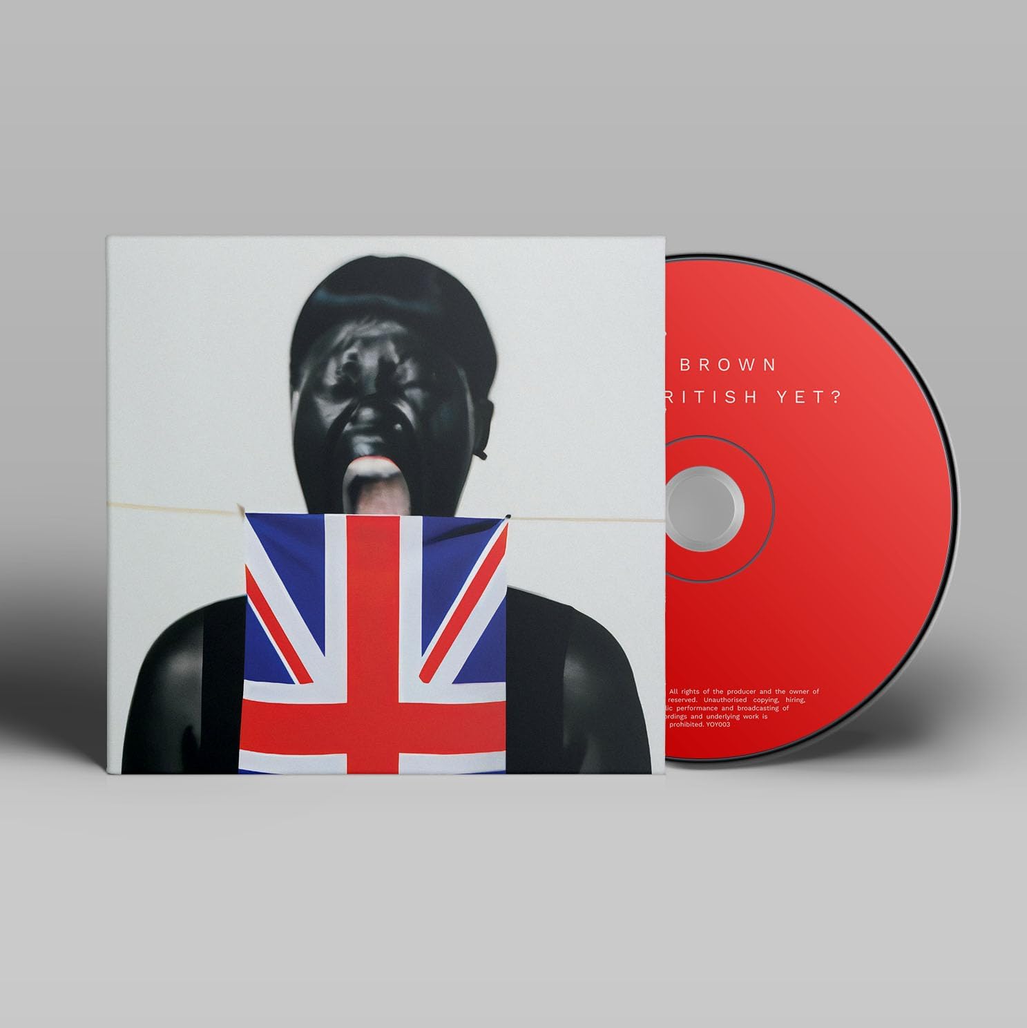 CD case featuring a person with a Union Jack flag and a red CD.