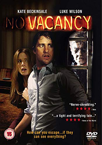 DVD cover of "Vacancy" showing two concerned people and a shadowy figure.