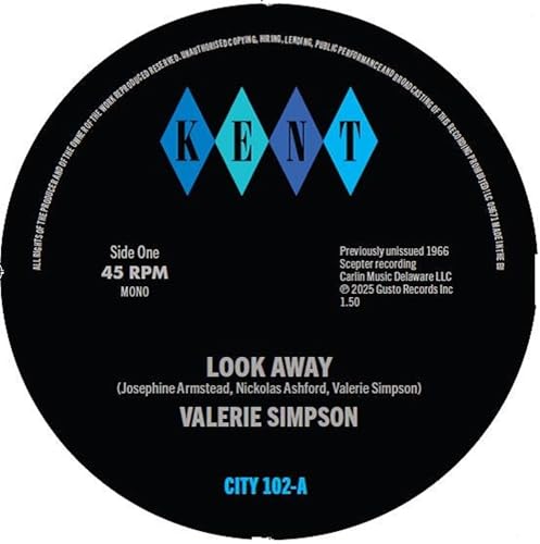 Black vinyl record label with blue geometric design and white text.