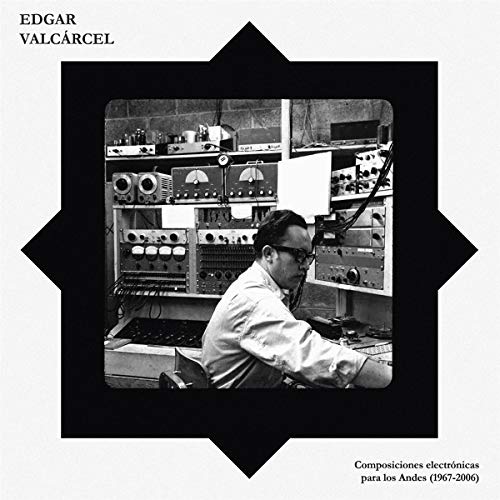 Vinyl album cover with black and white photo of man surrounded by electronic equipment.