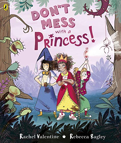 Three girls dressed as adventurers stand in a spooky forest.
