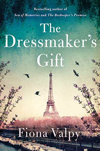Book cover with Eiffel Tower, birds, and floral branches.