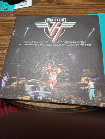 Van Halen live album cover featuring a concert performance image.