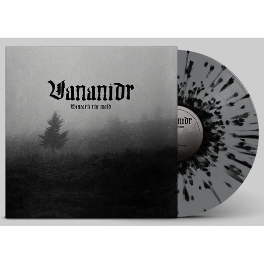 Vinyl record with black and grey splatter design next to its misty forest cover.