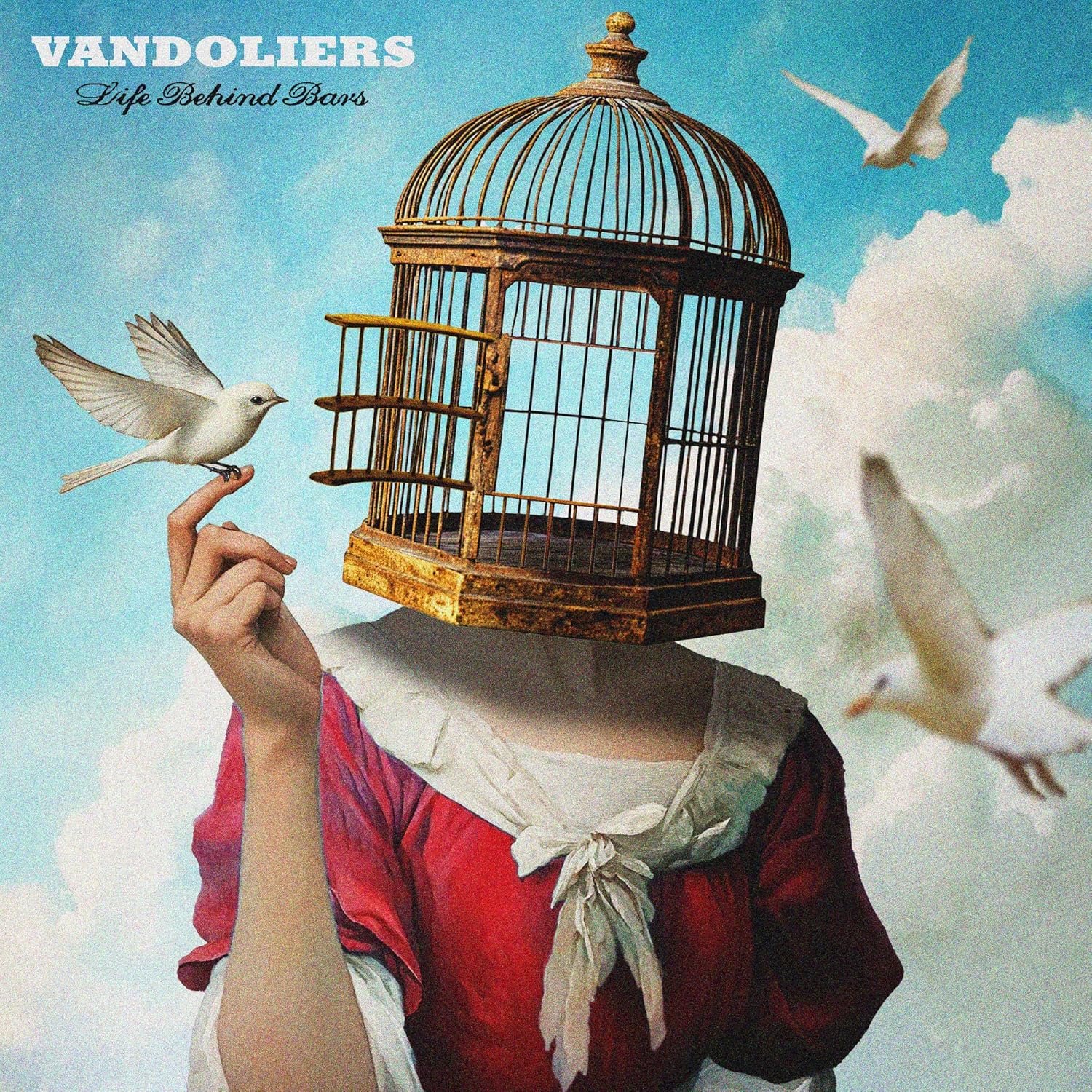Album cover: hand, birds, and ornate birdcage against a blue sky.