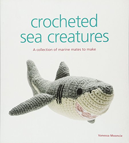 Book cover featuring a crocheted grey shark with white belly.
