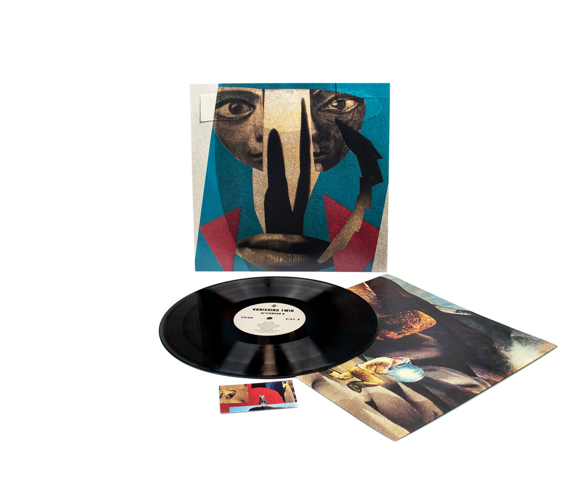 "Vinyl record with abstract cover art featuring a face and geometric shapes."