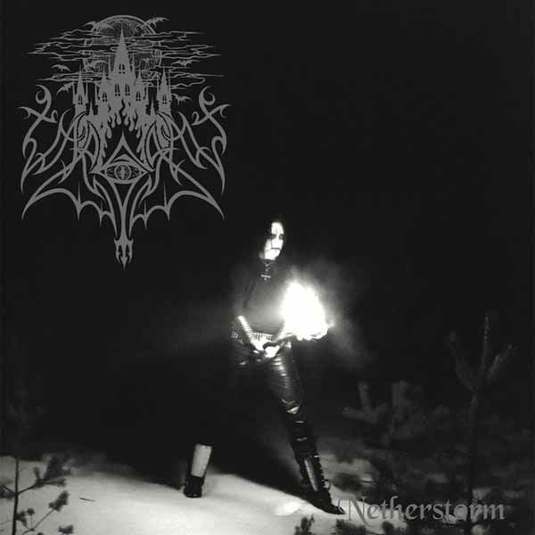Black and white album cover featuring a figure with flames, gothic castle illustration.