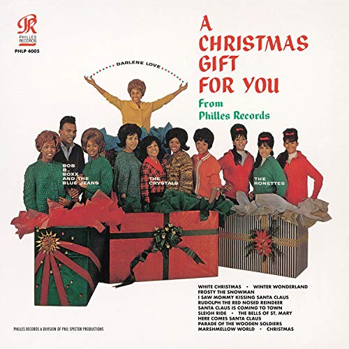 1960s album cover featuring a group of musicians and gift boxes.