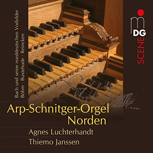 Close-up of a wooden organ keyboard with sheet music and album title.