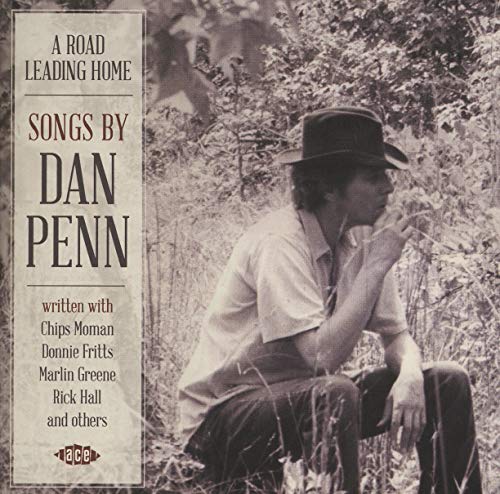 CD cover: man with hat in field, text “A Road Leading Home”.